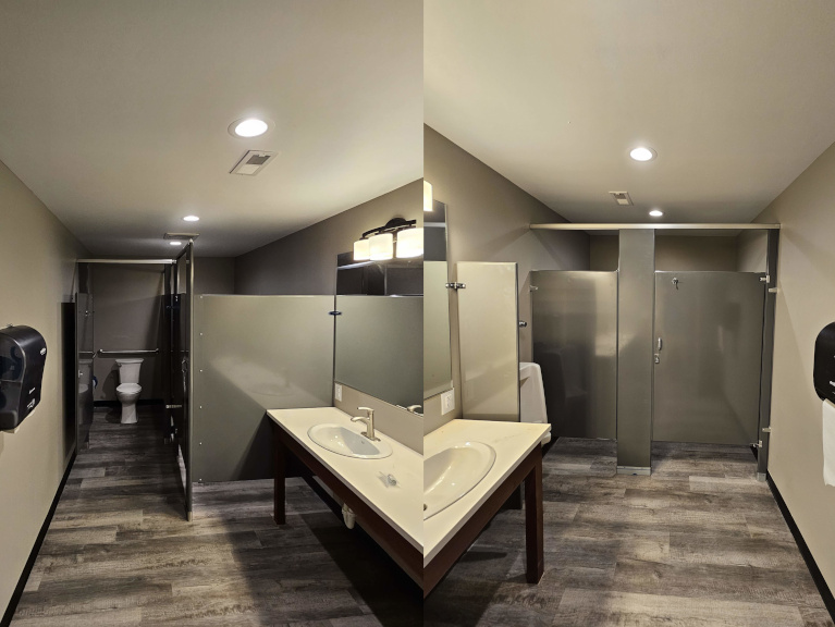 Finished bathrooms — panoramic view of both men's and women's rooms