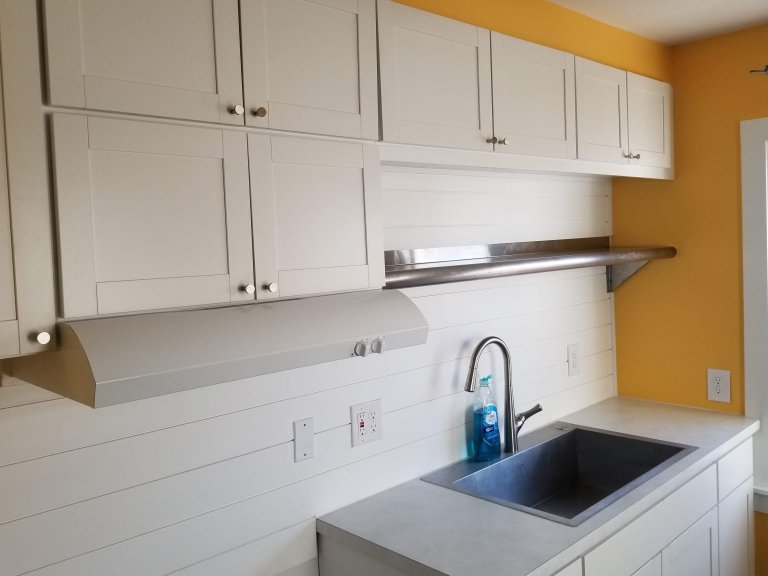 Painted shiplap walls — exactly what the client envisioned