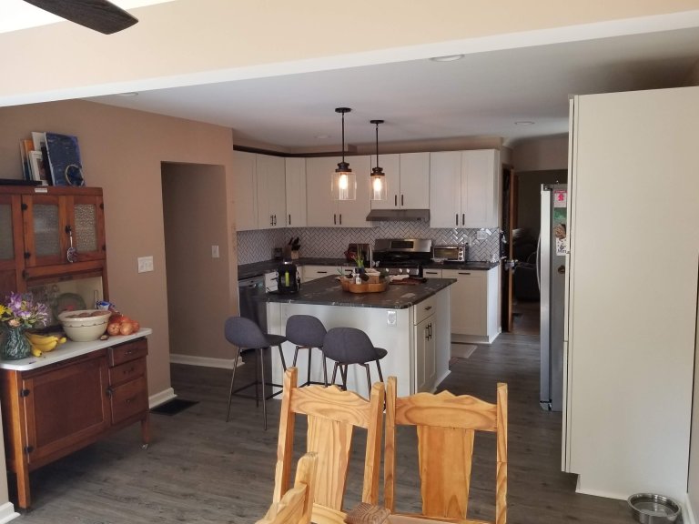 The full kitchen viewed from the dining area — one continuous space