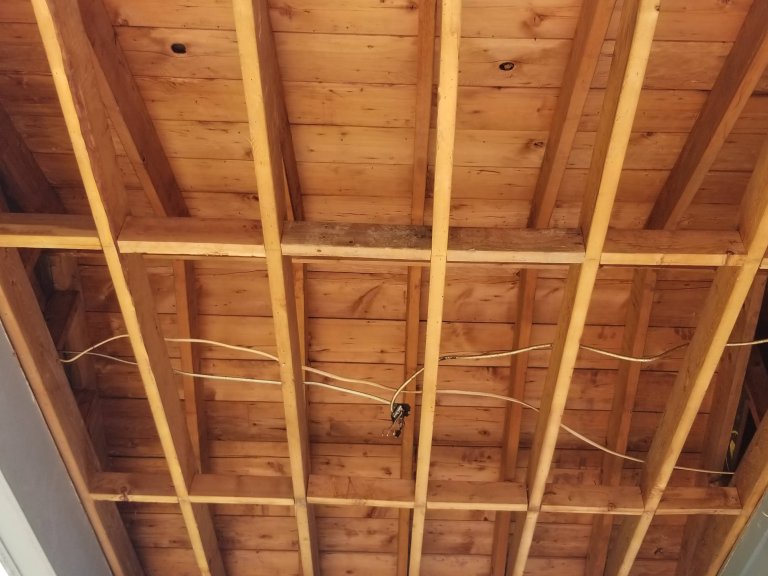 Porch roof structure with no insulation — not yet designed for conditioned space