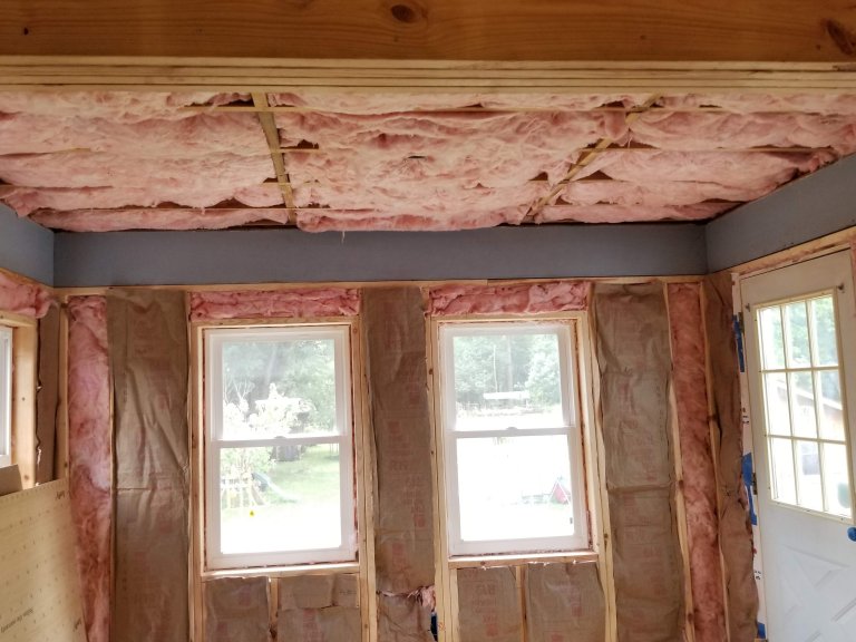 Batt insulation installed in the walls and ceiling of the new addition
