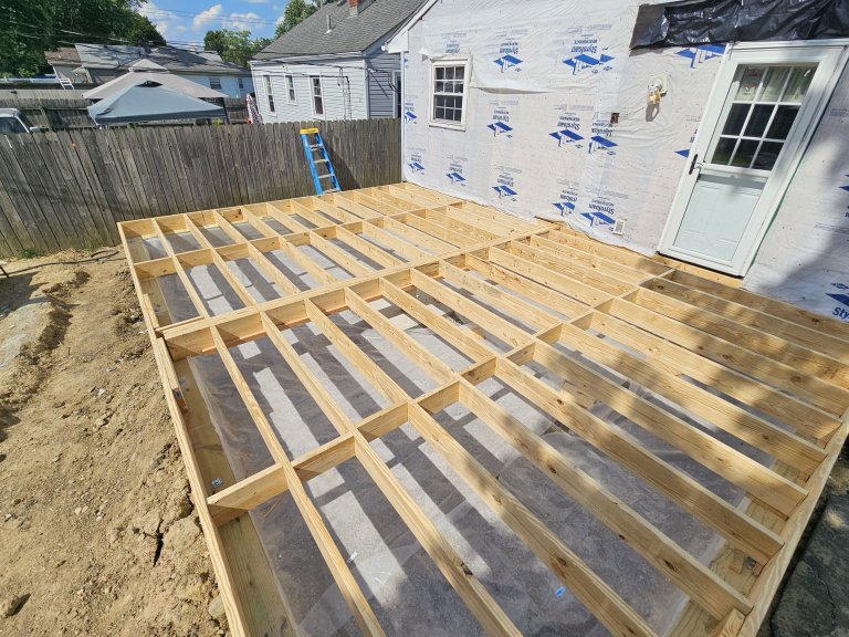 Floor framing finished and vapor barrier installed