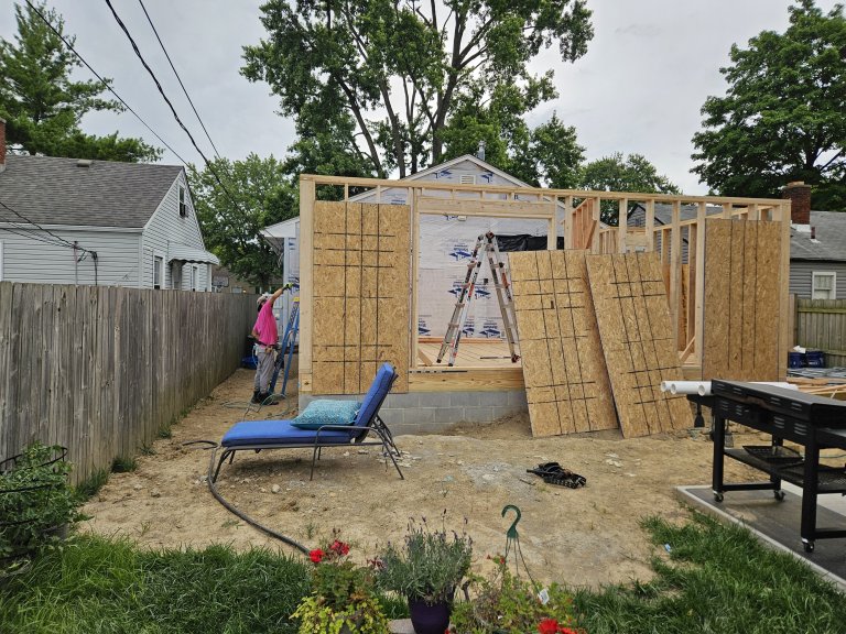 Walls up installing the sheathing