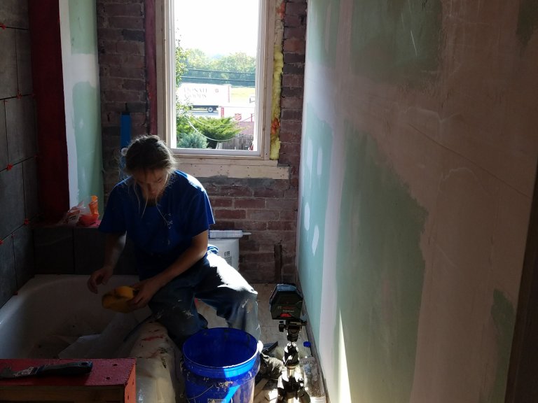 Bath installing tile