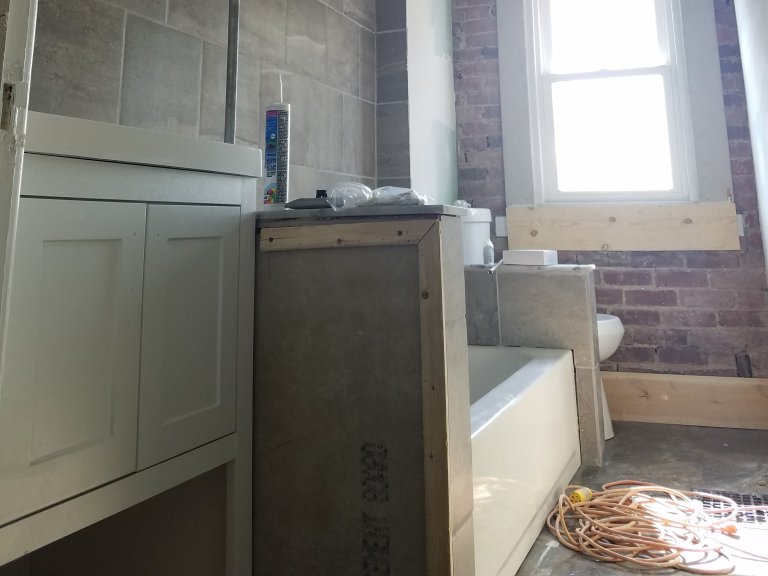 Bath exposed brick exterior wall
