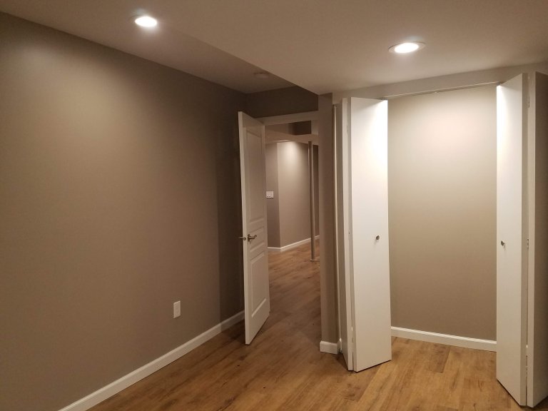 Basement bed facing west, closet on right 