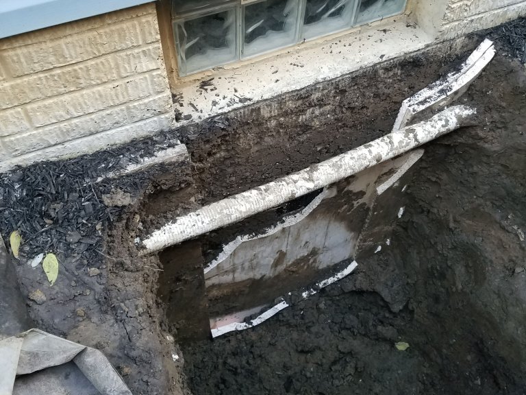 Basement exterior digging away