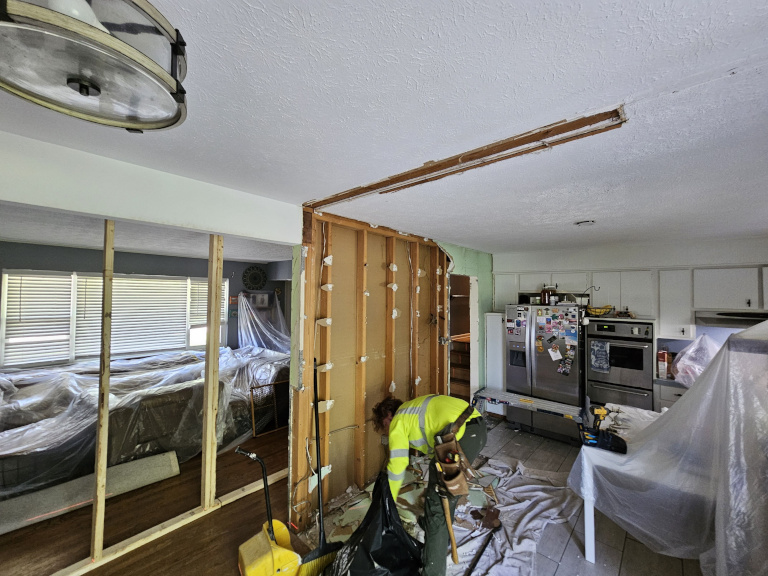 E.B. — Bearing Wall & I-Beam Installation — Before