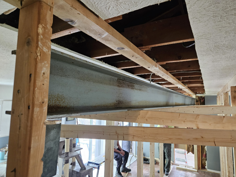 E.B. — Bearing Wall & I-Beam Installation — During