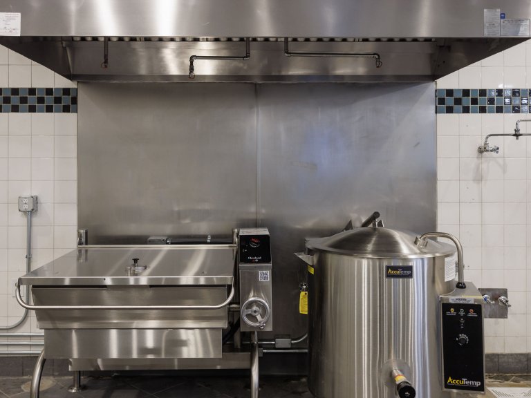 New tilt skillet on the left and steam jacket on the right. note the pot filler just above the steam jacket.